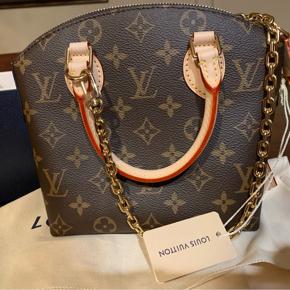Absolutely stunning brand new authentic rare and collectible Louis Vuitton purse